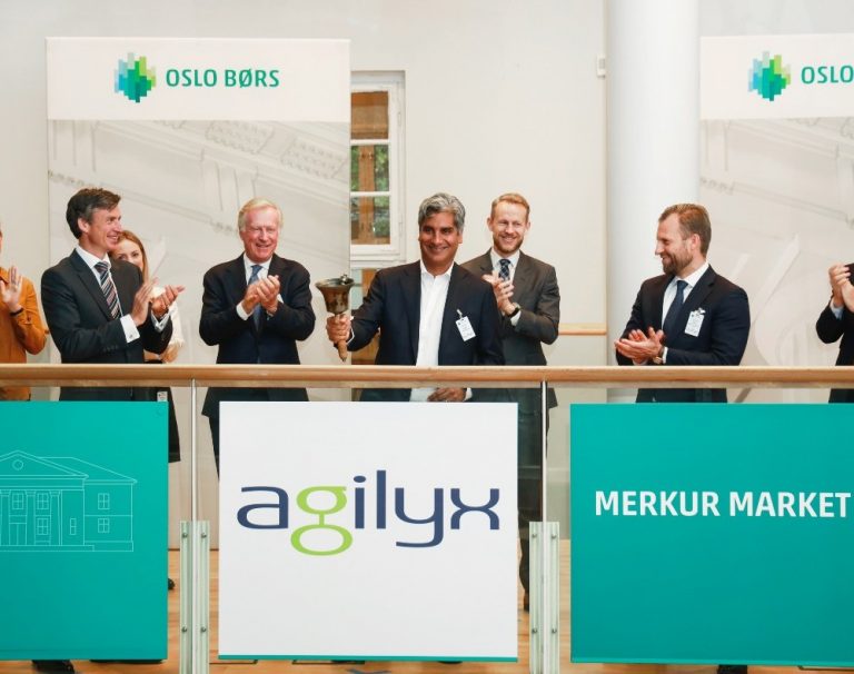 Board members for Agilyx ring the bell as the company's shares begin trading on the EuroNext Growth Exchange in Oslo.